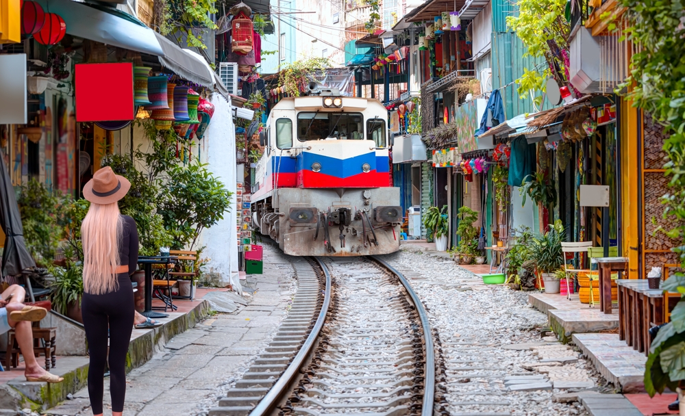 A,Blonde,Woman,Wearing,Black,Tights,And,A,Beige,Hat