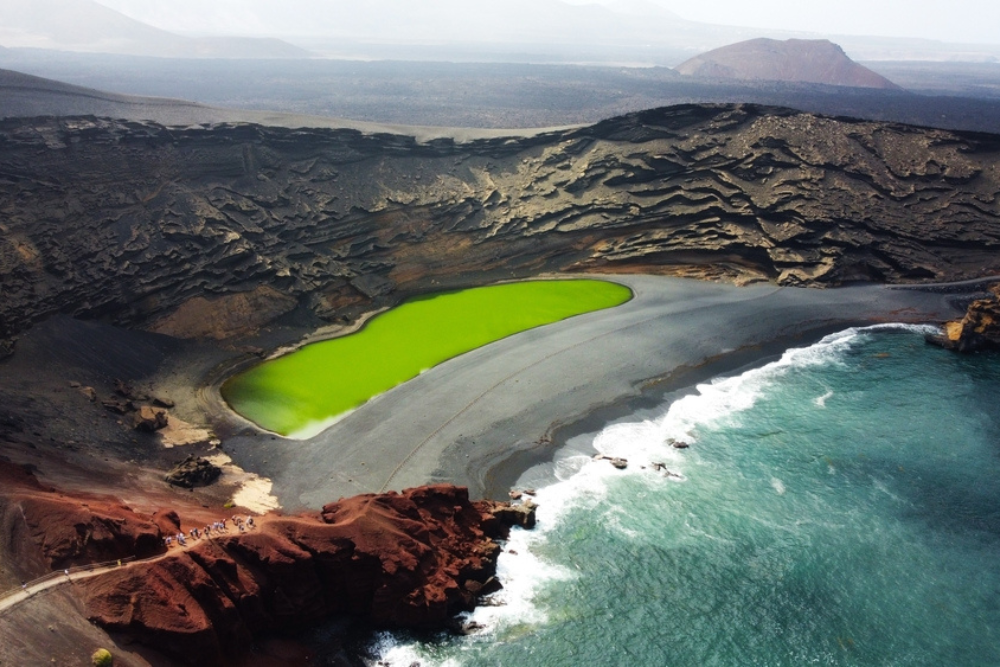 Aerial view of Volcanic Lake El Golfo, Lanzarote, Canary Islands, Spain Drone